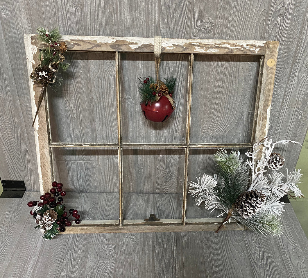 Vintage white Christmas window with large bell